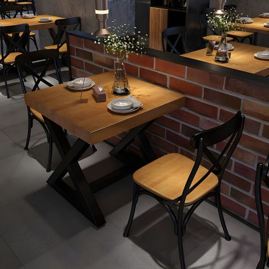 Table à manger en bois industriel pour restaurant avec base en tréteau